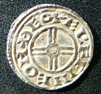 Silver penny of King Canute. The coin shown here is attributed to the period from 1029 to 1036. The inscription shown indicates that it was minted by Elfwine of Thetford.