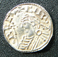 Silver penny of King Canute. The portrait shown here is attributed to the period from 1029 to 1036. Portraits from 1020 were enclosed in a quatrefoil, and from 1024 to 1030 included types of pointed helmet.